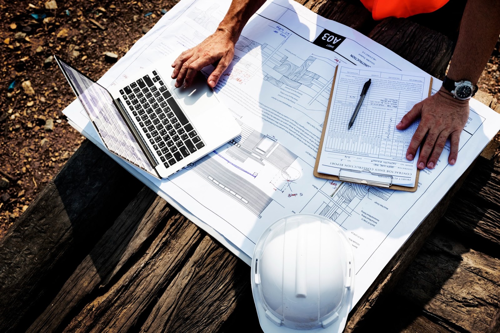 construction worker with documents